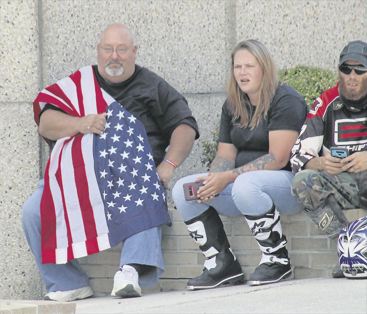 Man wearing flag